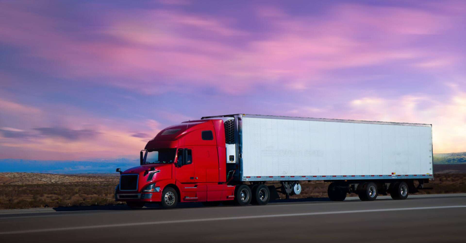 Dry van semi truck on the highway