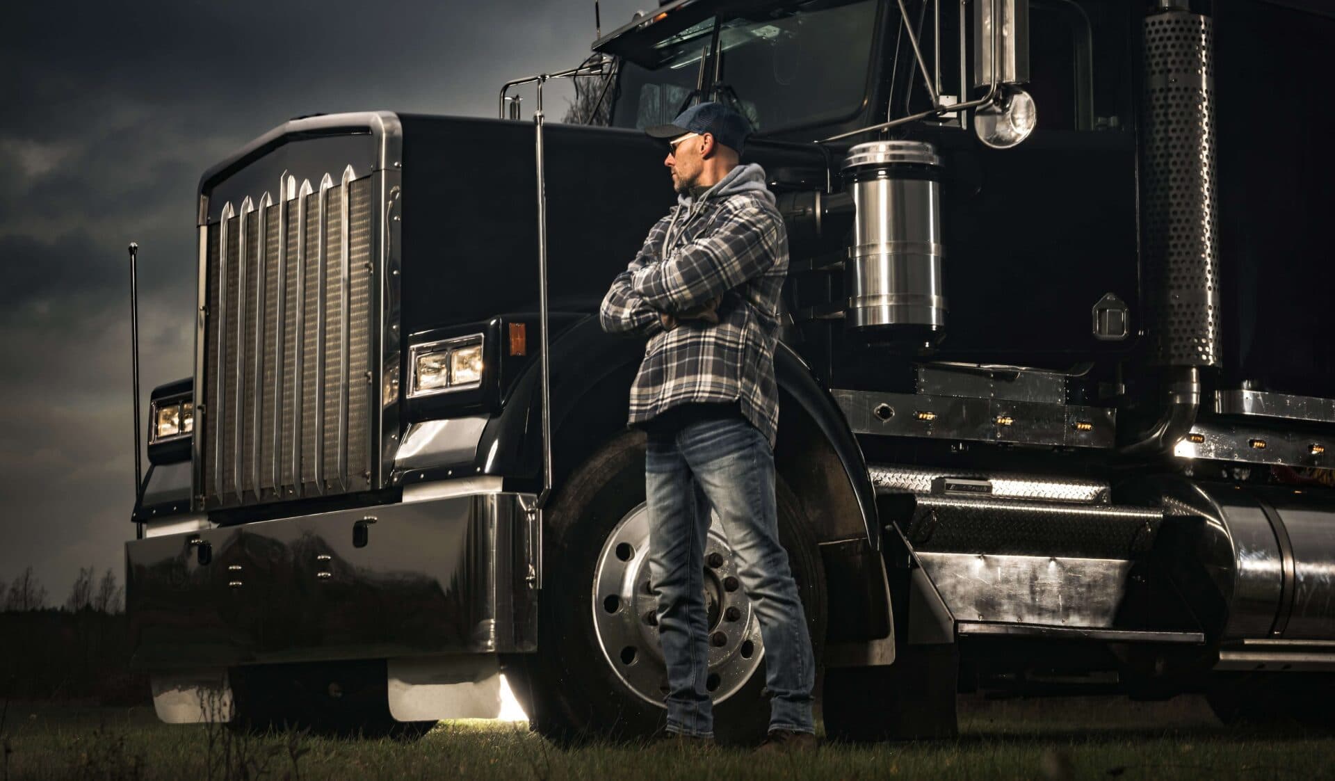 Driver beside a tractor